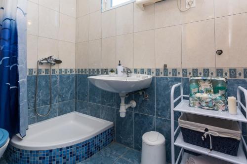 Ένα μπάνιο στο Apartments Marko