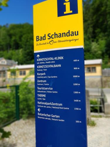 a sign for a bad stanjaduana on a street at Apartmenthaus Luise in Bad Schandau