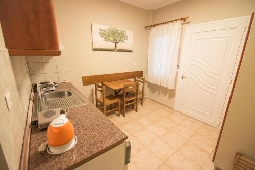 Una cocina o cocineta en acquablue apartments