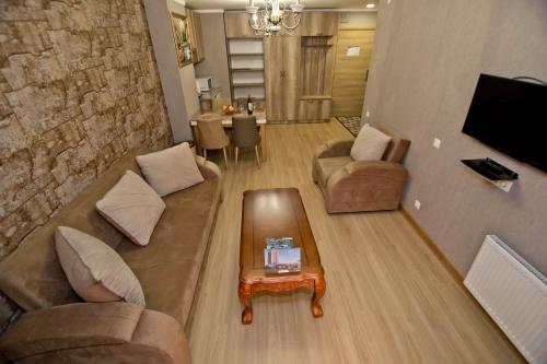 A seating area at Orbi Bakuriani apartment 731