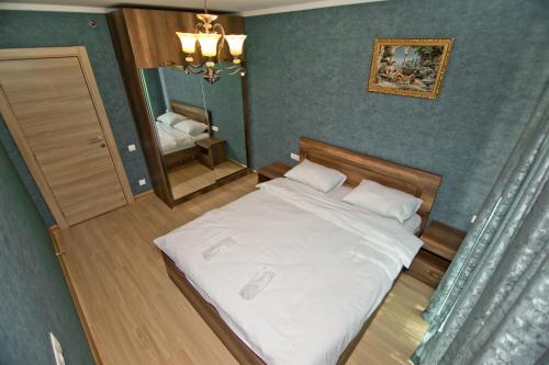 A bed or beds in a room at Orbi Bakuriani apartment 731