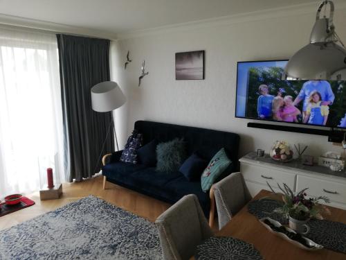 TV a/nebo společenská místnost v ubytování Apartament na Morskim Wzgórzu