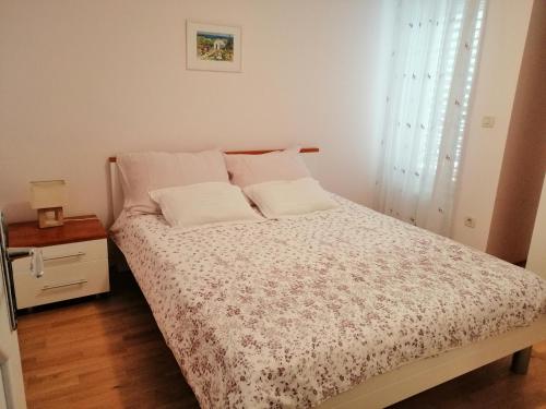 Postel nebo postele na pokoji v ubytování Apartment Markorcula