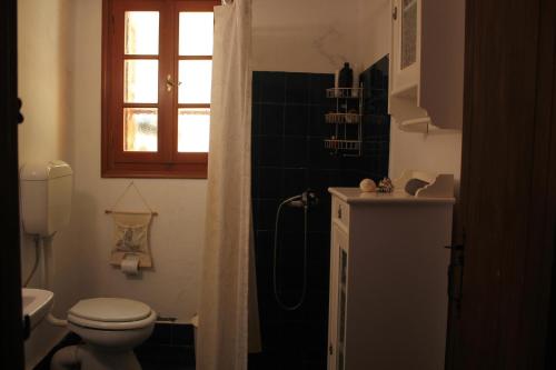Koupelna v ubytování Astradeni