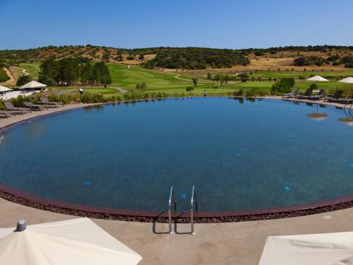 an overhead view of a large swimming pool at a resort at NAU Morgado Golf & Country Club in Portimão