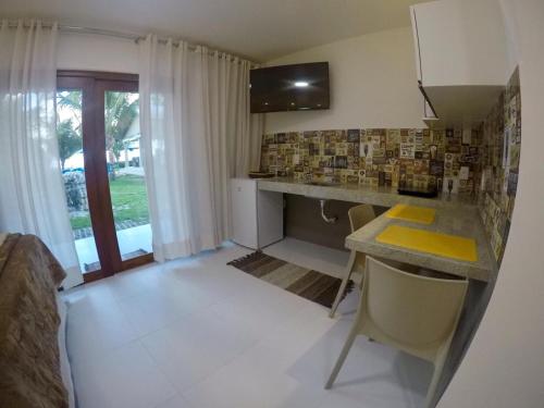 Kuchyň nebo kuchyňský kout v ubytování Pousada Ipioca Beach Village