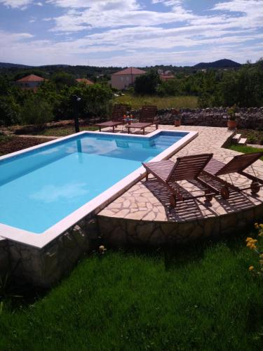 Uma vista da piscina em Kuca za odmor Bozena ou nos arredores