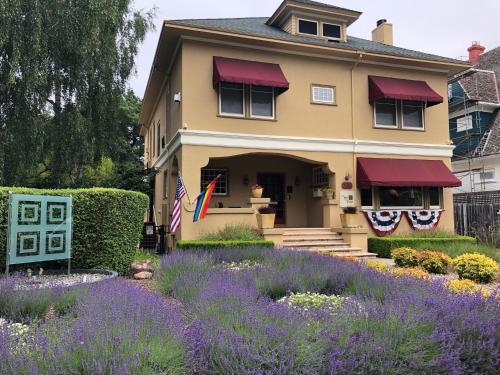 a house with purple flowers in front of it at The Inn on First in Napa