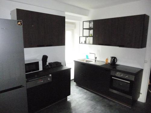 Dapur atau dapur kecil di Appartement duplex 3 chambre 85m2
