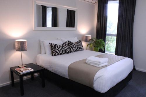 Ένα ή περισσότερα κρεβάτια σε δωμάτιο στο Prom Country Lodge