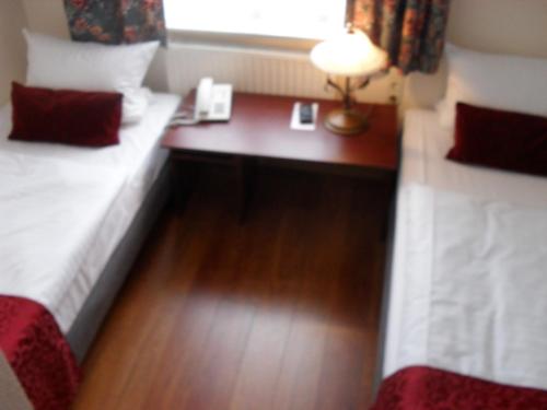 Una cama o camas en una habitación de In Piazza