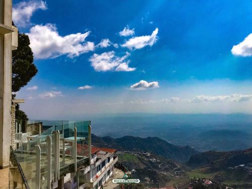a view of the mountains from a building at The Fern Brentwood Resort, Mussoorie in Mussoorie