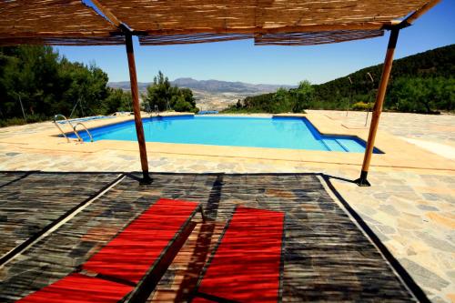 Bazén v ubytování Posada del Candil nebo v jeho okolí