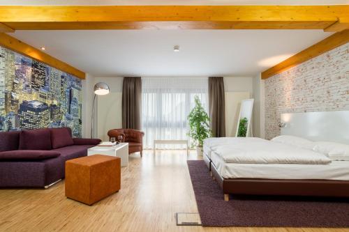 Posezení v ubytování Hotel l'adresse garni