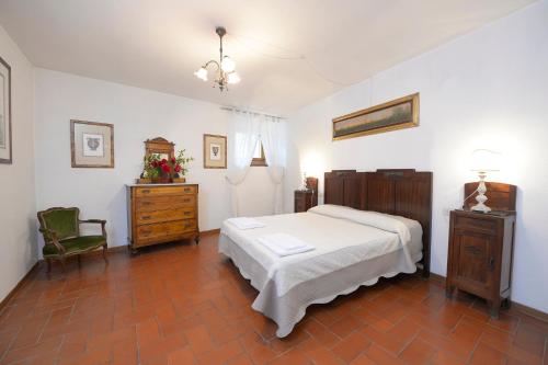 Ένα ή περισσότερα κρεβάτια σε δωμάτιο στο Casa Vacanze Podere Ugolini
