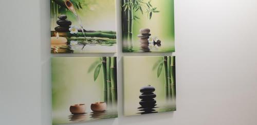 a group of four pictures of rocks in water at ele&gio accomodation in Tropea