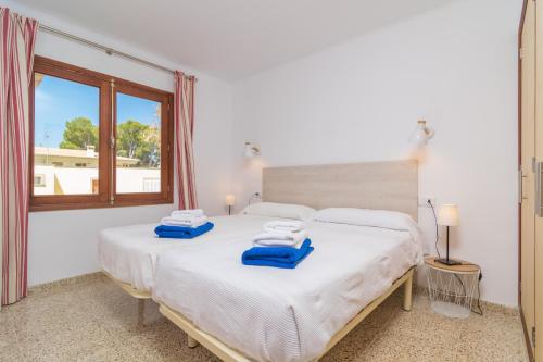 A bed or beds in a room at Garballons 5 1D