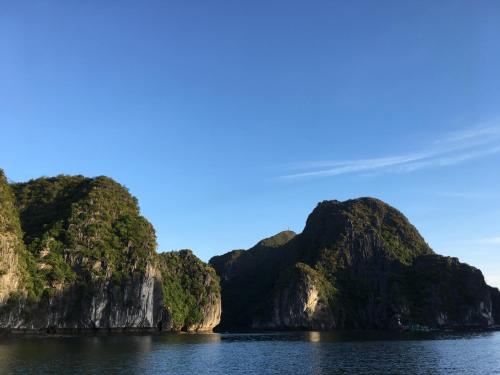 a view of three islands in the water at Cat Ba Bay Cruises in Cat Ba
