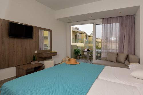 Ένα ή περισσότερα κρεβάτια σε δωμάτιο στο Blue Horizon Apartments 
