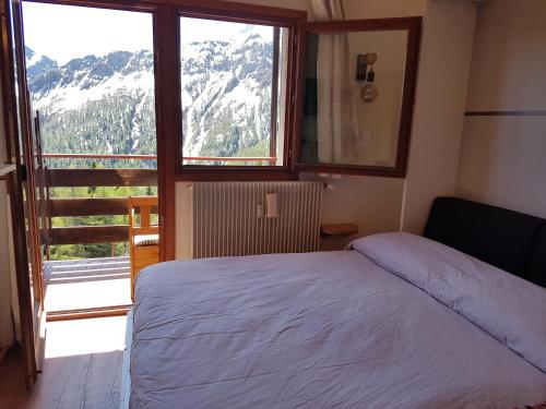 Postel nebo postele na pokoji v ubytování Casa Mowgli - Residence Sussy