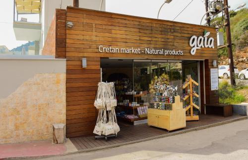 a store front of a retail store with a store at Blue Horizon Apartments in Balíon