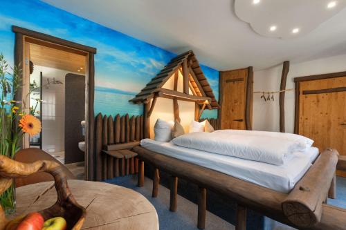 a bedroom with a large bed in a room at Landgasthof Paradies in Frickingen
