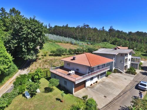 an overhead view of a house with a roof at Casa Ardaña in Carballo