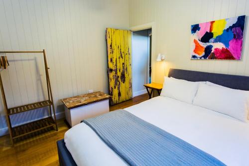 מיטה או מיטות בחדר ב-Kenilworth Cottage Barcaldine