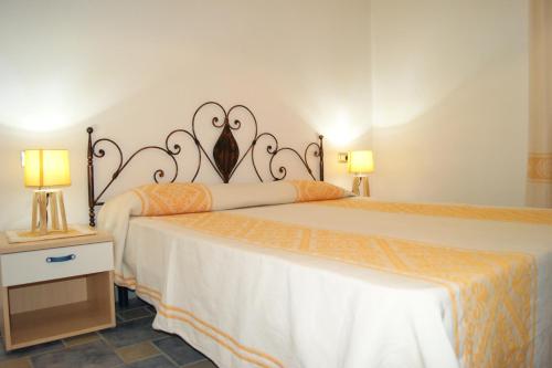 Ένα ή περισσότερα κρεβάτια σε δωμάτιο στο Casa vacanza Tanaunella