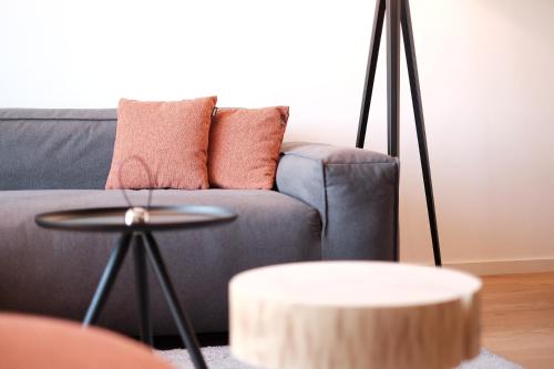 a living room with a couch and a table at Fritz Lauterbad in Freudenstadt