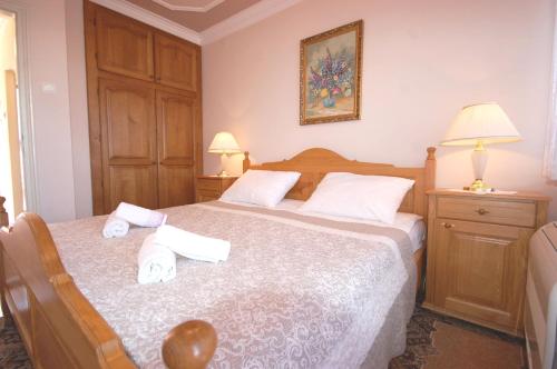 Ένα ή περισσότερα κρεβάτια σε δωμάτιο στο Apartment Poljak Njivice