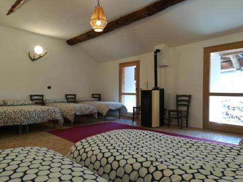Postel nebo postele na pokoji v ubytování Cantina Alpina