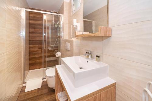 Kúpeľňa v ubytovaní Apartments Kricin II