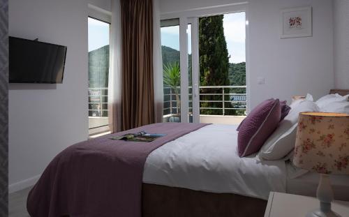 Postel nebo postele na pokoji v ubytování Luxury Apartment Mr. Perfect