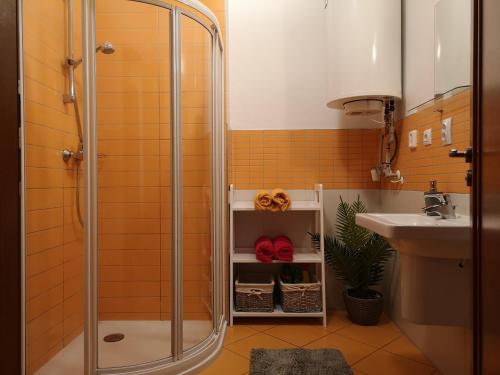 Et badeværelse på Apartmanovy Dom Triangel