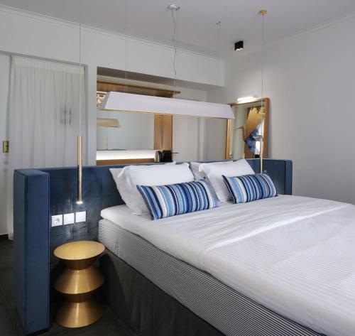 Postel nebo postele na pokoji v ubytování Thomais Boutique Hotel