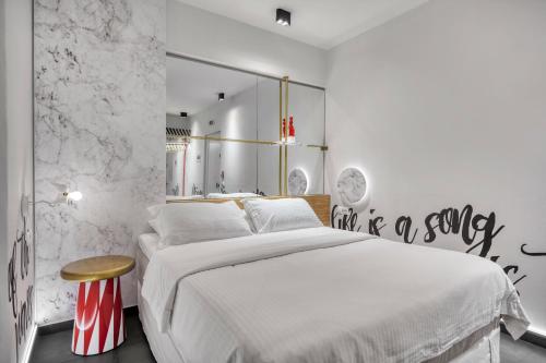Postel nebo postele na pokoji v ubytování Thomais Boutique Hotel
