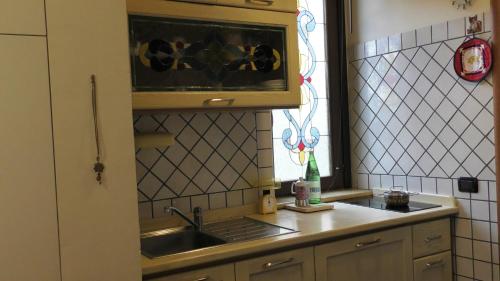 a small kitchen with a sink and a window at Studio Liberty in Fiuggi