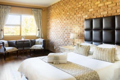 Postel nebo postele na pokoji v ubytování Willows Garden Hotel Potchefstroom