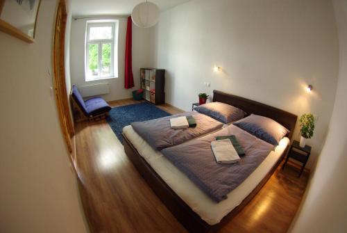 Postel nebo postele na pokoji v ubytování Apartman Egidius