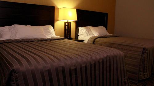 Cama o camas de una habitación en Victoria Motor Inn