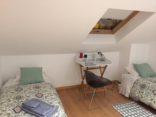 Cama o camas de una habitación en LX Oriente Loft Apartment