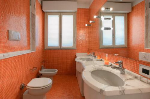 Salle de bains dans l'établissement Giardini e Mare
