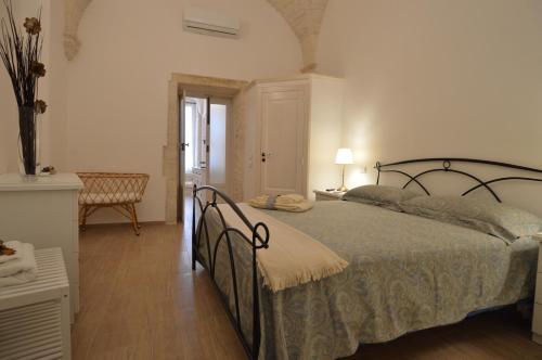Ένα ή περισσότερα κρεβάτια σε δωμάτιο στο La dimora di nonna Dora
