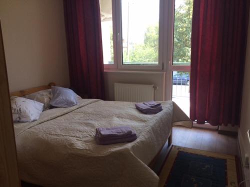 Ένα ή περισσότερα κρεβάτια σε δωμάτιο στο Rehab Apartment