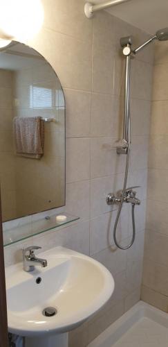 a bathroom with a sink and a shower at EMILIA 11 STUDIO in Polis Chrysochous