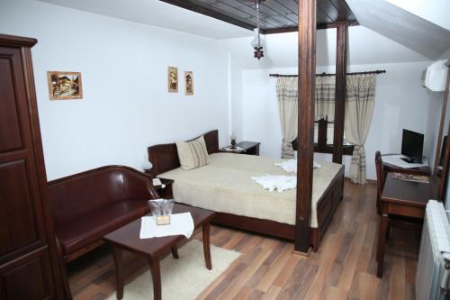 Tempat tidur dalam kamar di Oazis Guesthouse