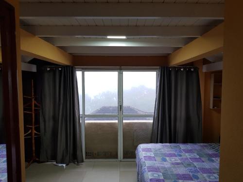 Katil atau katil-katil dalam bilik di Pousada Kolonisten Haus