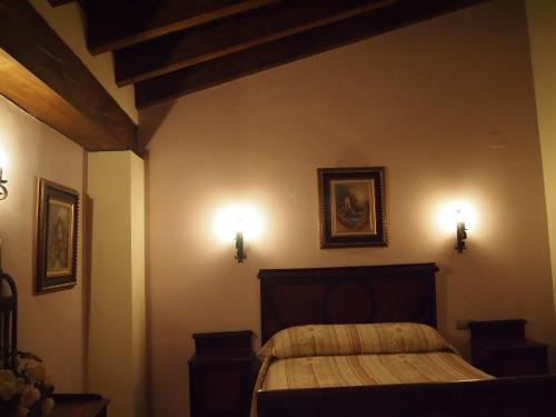 Giường trong phòng chung tại Vivienda Turística Rural Casa Camilo