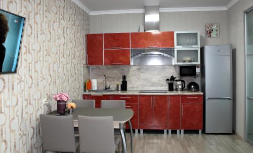 Кухня или мини-кухня в Апартаменты в Сан-Марина 